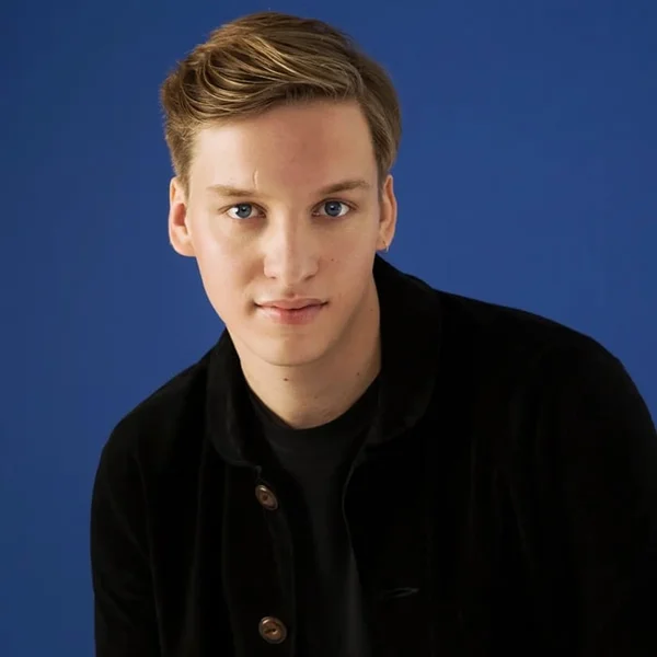 Exclusively - George Ezra logo
