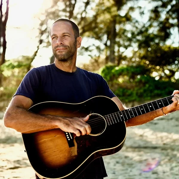 Exclusively - Jack Johnson logo